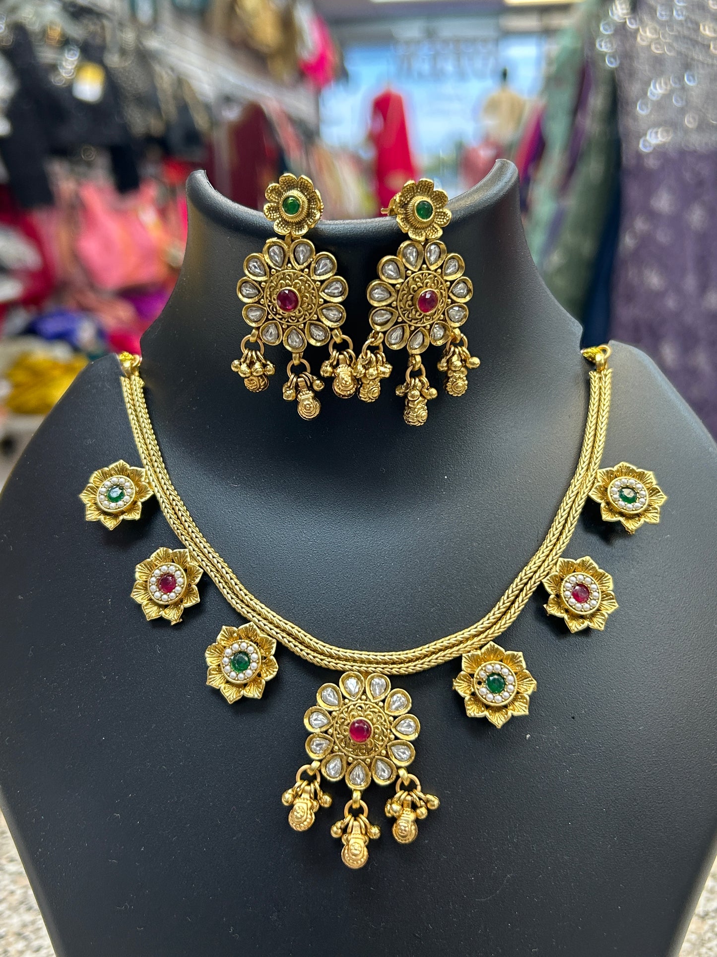 Gold polished necklace set by Kurti Connection USA