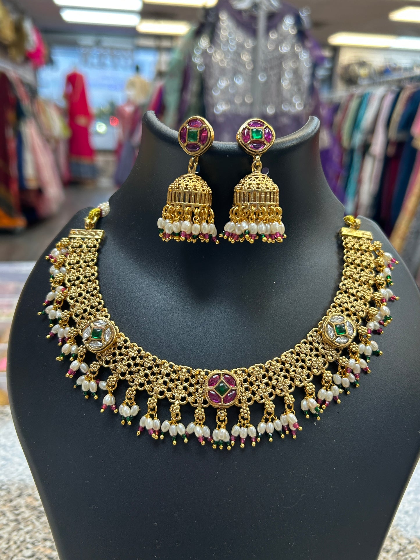 Gold polished necklace set by Kurti Connection USA