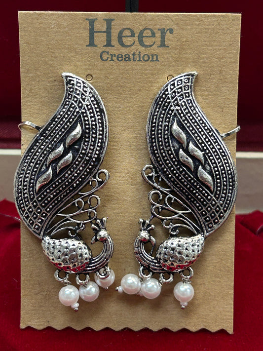 Peacock earrings: earcuffs by Kurti Connection USA