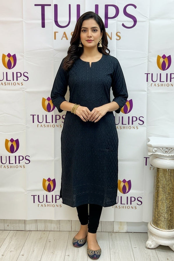 Kurti Connection USA black embroidered cotton kurti with V-neck and three-quarter sleeves, worn by a model.
