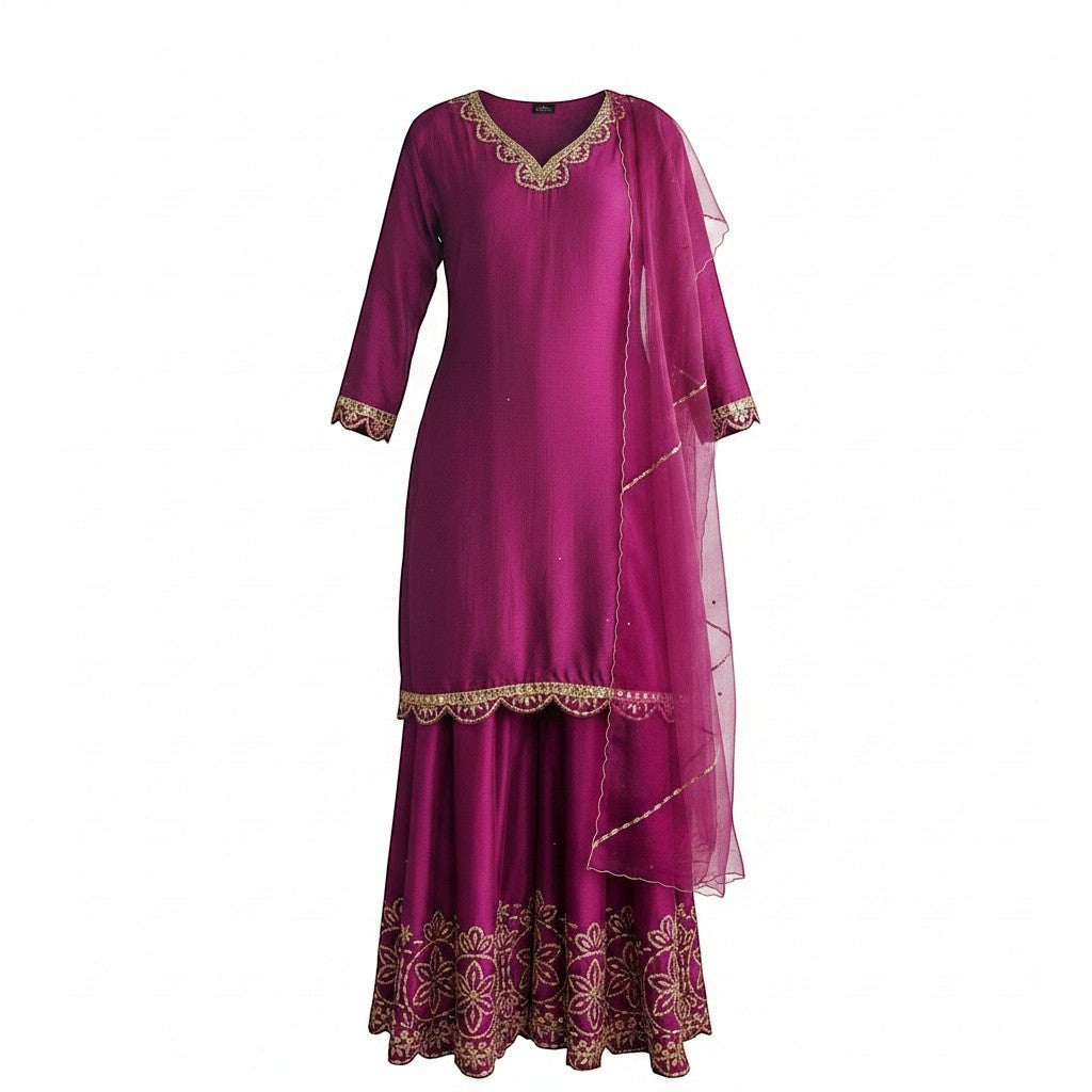 Kurti Connection USA magenta silk sharara suit with gold embroidery on neckline, cuffs, and hem. Includes sheer dupatta.