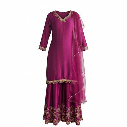 Kurti Connection USA magenta silk sharara suit with gold embroidery on neckline, cuffs, and hem. Includes sheer dupatta.
