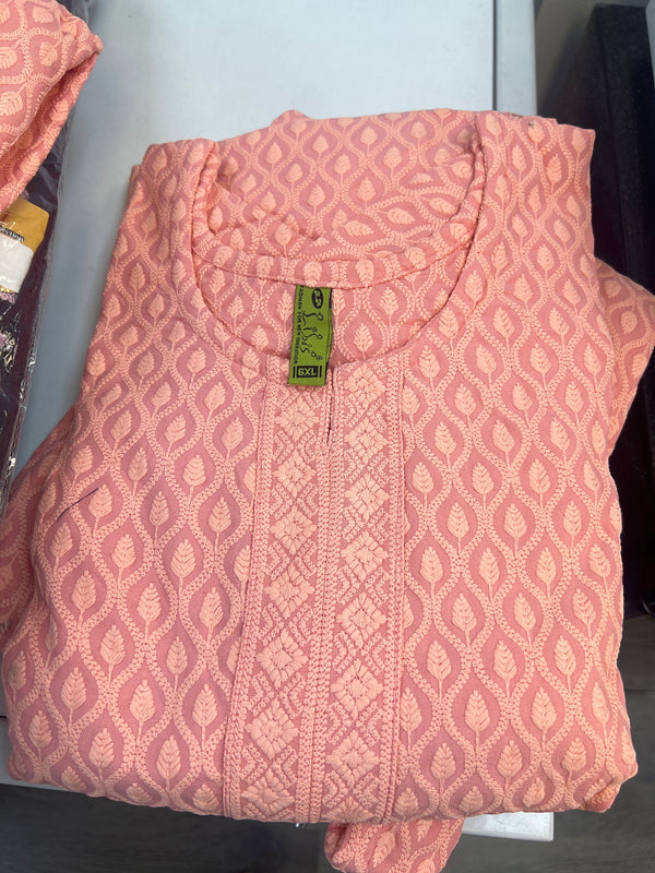 Kurti Connection USA peach kurti top with all-over leaf embroidery and textured front panel. Relaxed fit, round neckline.