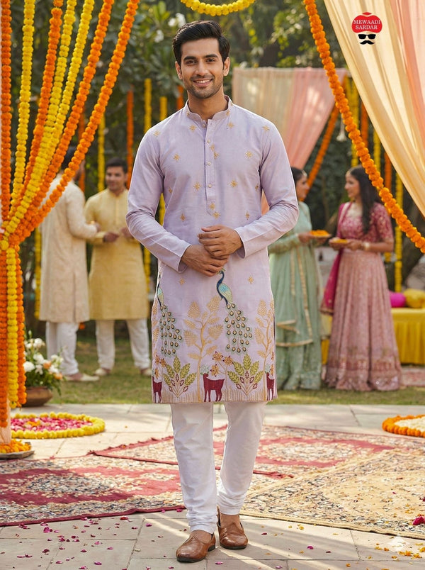 Kurti Connection USA light purple silk kurta set with intricate embroidery of peacocks and deer, paired with white pajama.